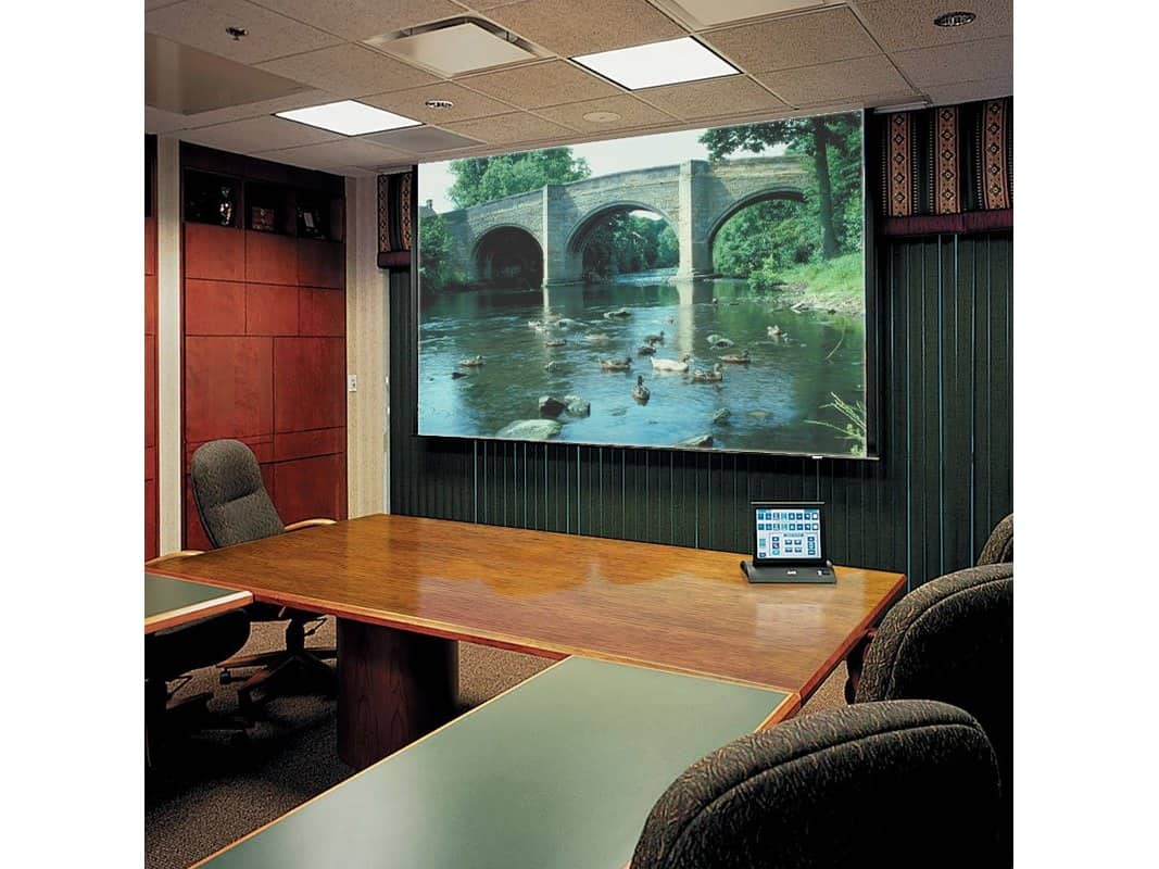 Draper Ultimate Access E projection screen installed in a conference room